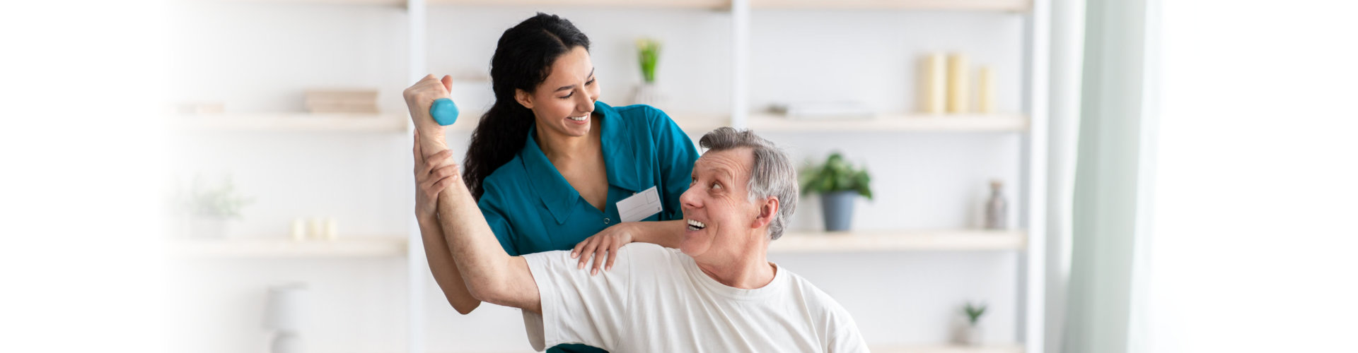 nurse assist her patient in his exercise routine